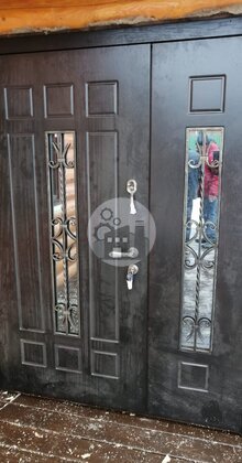 двустворчатая дверь с двумя стеклопакетами